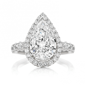 Delicate Pear with Round Halo and Cathedral Band